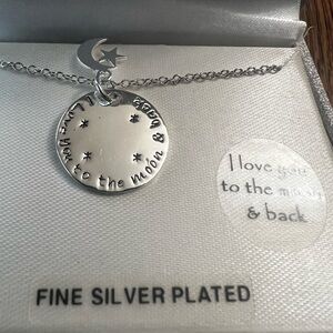 Brand new silver plated neckless with “I love you to the moon and back”